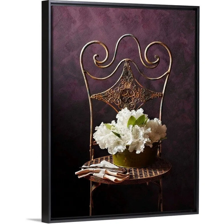 "Bouquet of rhododendron flowers in tin on chair with gardening gloves" Black Float Frame Canvas Art